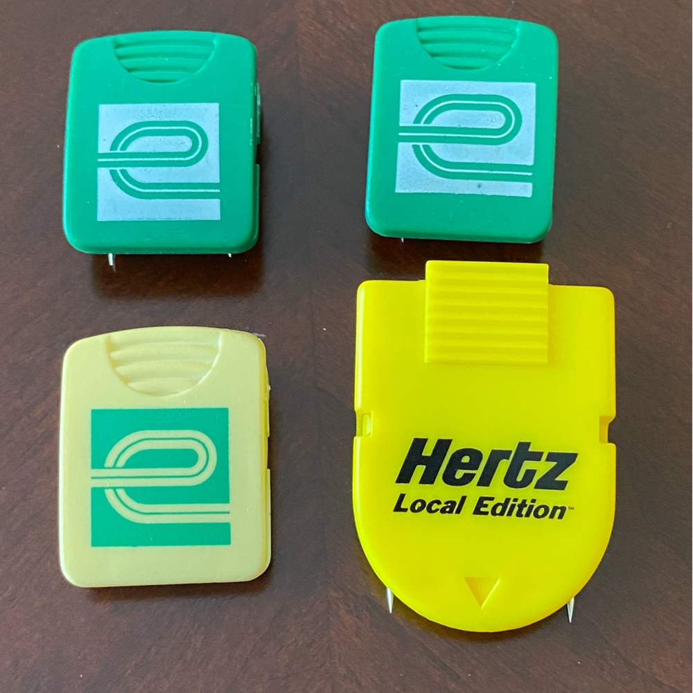 Cubicle Wall Paper Clips Advertising by Enterprise and Hertz